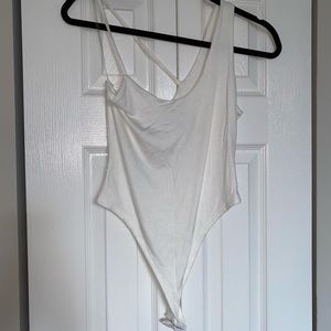 Asymmetrical white bodysuit